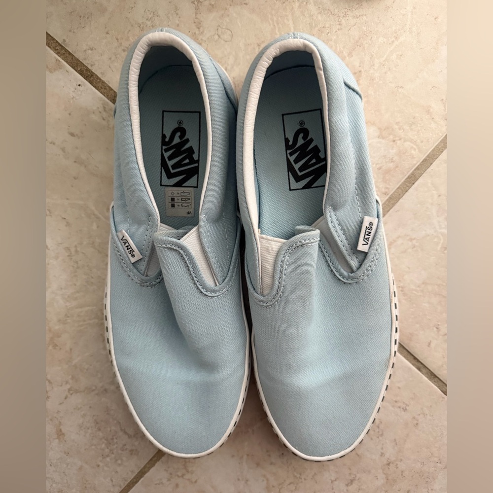 Vans Sky Blue Slip-On Sneakers with checkered sole